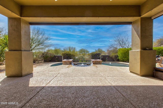 view of patio featuring a fenced in pool and fence