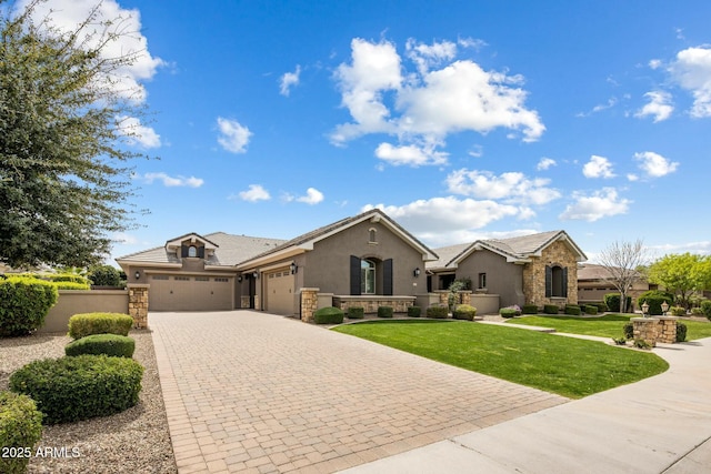 2051 E Aris Dr, Gilbert, AZ 85298 - single story home with a garage, stone siding, stucco siding, and decorative driveway