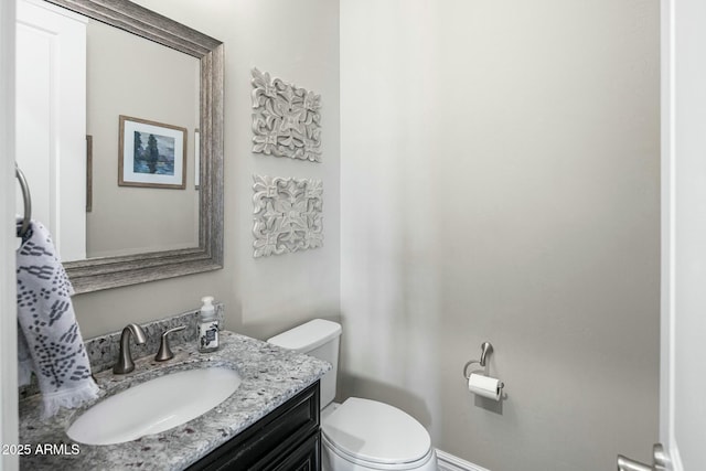 2051 E Aris Dr, Gilbert, AZ 85298 - half bath with baseboards, toilet, and vanity