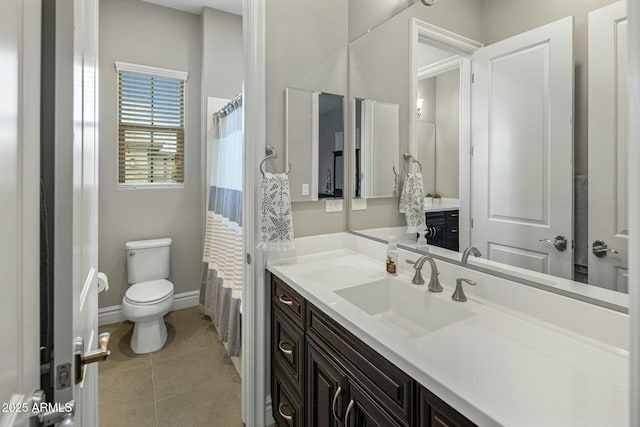 2051 E Aris Dr, Gilbert, AZ 85298 - full bathroom featuring tile patterned floors, a shower with curtain, toilet, baseboards, and vanity