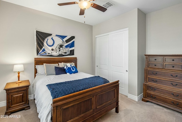 2051 E Aris Dr, Gilbert, AZ 85298 - bedroom with light carpet, baseboards, visible vents, a closet, and ceiling fan