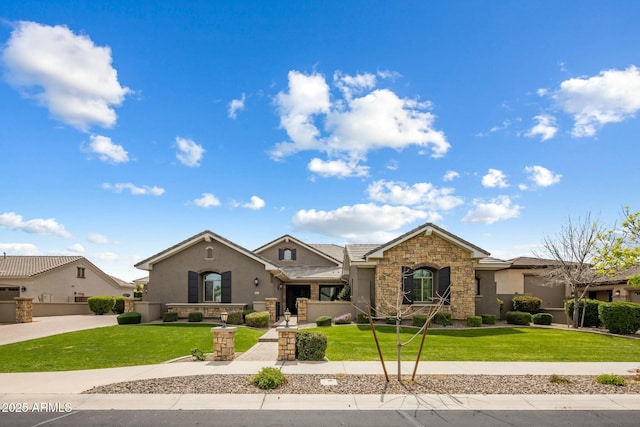 2051 E Aris Dr, Gilbert, AZ 85298 - view of front of property with stucco siding, a front lawn, and stone siding