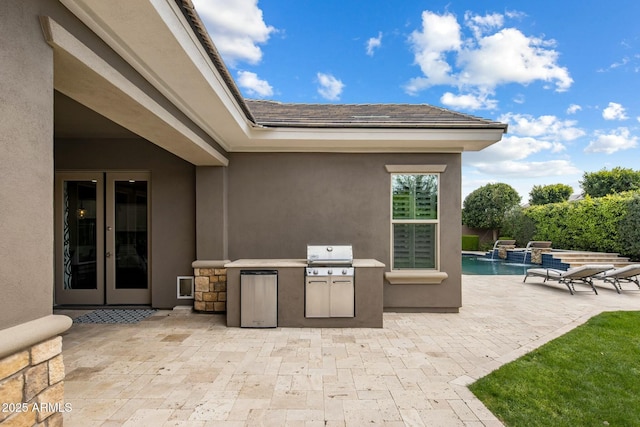 2051 E Aris Dr, Gilbert, AZ 85298 - view of patio / terrace featuring area for grilling, a grill, a fenced in pool, and french doors