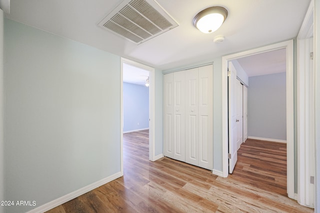 hallway featuring light wood-type flooring