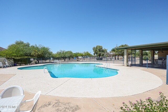 view of swimming pool featuring a patio