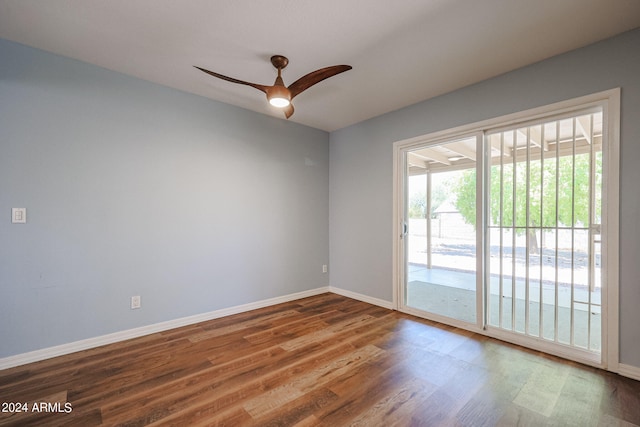 spare room featuring ceiling fan and wood-type flooring