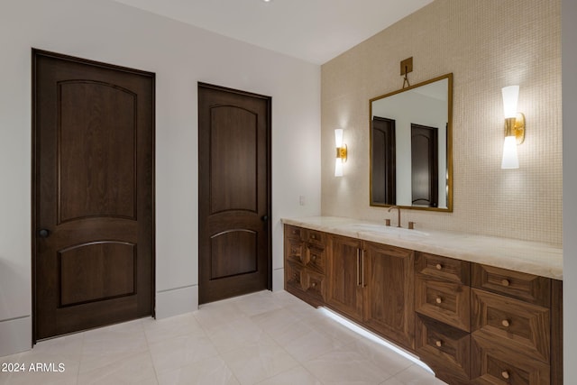 bathroom with vanity and tile patterned floors