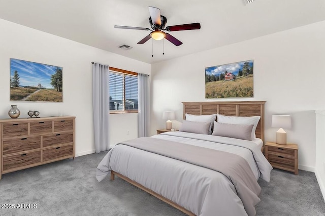 bedroom featuring visible vents, carpet flooring, baseboards, and a ceiling fan