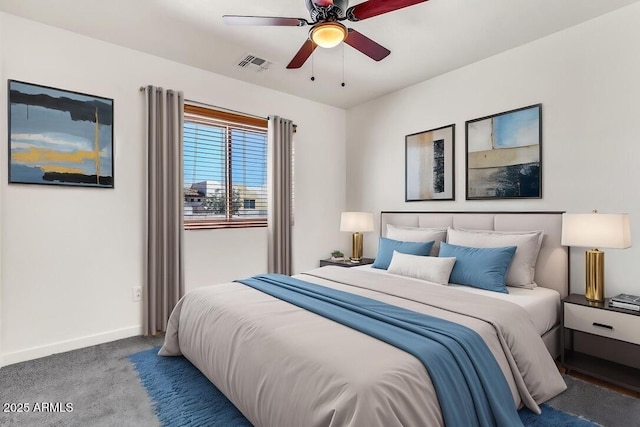 carpeted bedroom with baseboards, visible vents, and ceiling fan