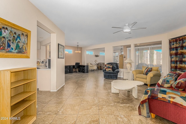 living room with a ceiling fan