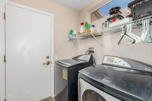 laundry area with laundry area and independent washer and dryer