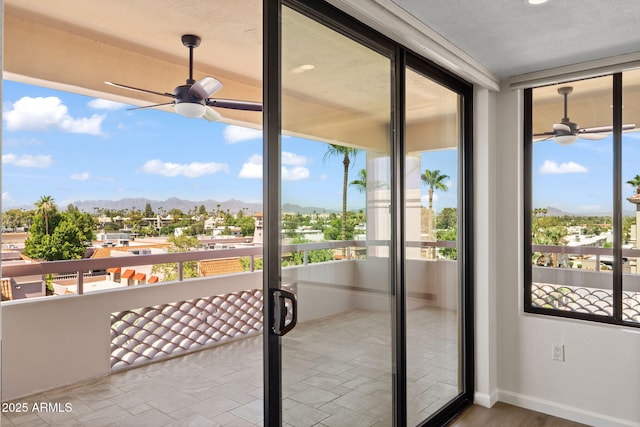 4200 N Miller Rd Unit 504, Scottsdale, AZ 85251 - unfurnished sunroom with a mountain view