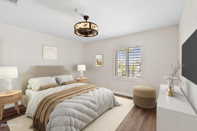4200 N Miller Rd Unit 504, Scottsdale, AZ 85251 - bedroom with wood finished floors and baseboards