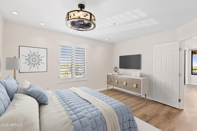 4200 N Miller Rd Unit 504, Scottsdale, AZ 85251 - bedroom featuring wood finished floors and recessed lighting