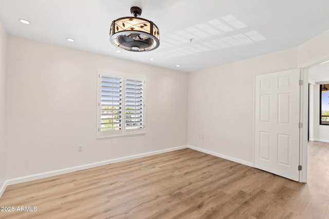 4200 N Miller Rd Unit 504, Scottsdale, AZ 85251 - unfurnished room with wood finished floors, healthy amount of natural light, and recessed lighting