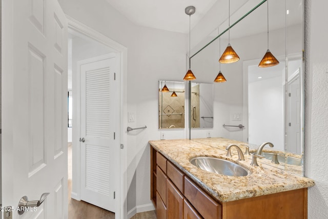 4200 N Miller Rd Unit 504, Scottsdale, AZ 85251 - bathroom featuring vanity and wood finished floors