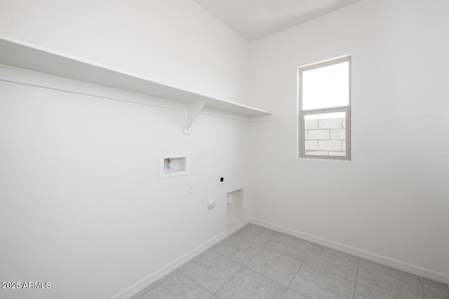 laundry room with hookup for a washing machine, hookup for an electric dryer, hookup for a gas dryer, and baseboards
