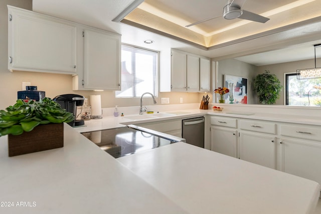 kitchen with dishwasher, white cabinetry, ceiling fan, and sink