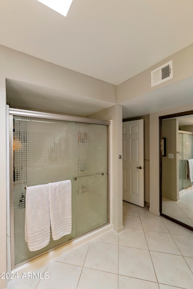 bathroom featuring tile patterned floors