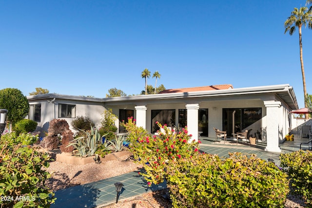 rear view of house with a patio area