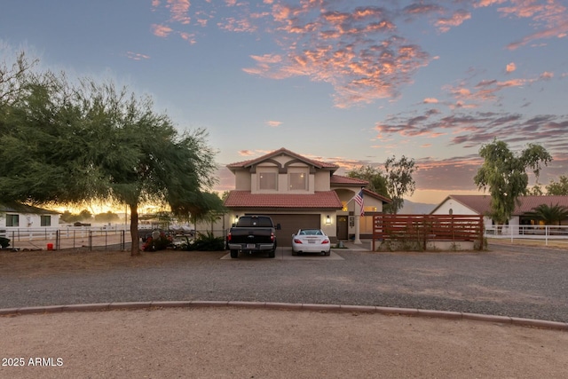 view of front of property featuring a garage