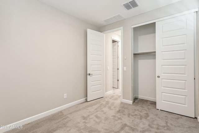 5815 E Covey Ln, Phoenix, AZ 85054 - unfurnished bedroom with carpet floors, baseboards, and a closet