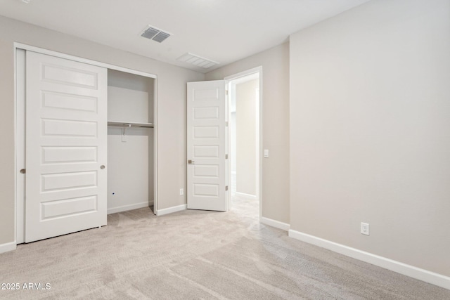 5815 E Covey Ln, Phoenix, AZ 85054 - unfurnished bedroom featuring a closet, carpet floors, and baseboards