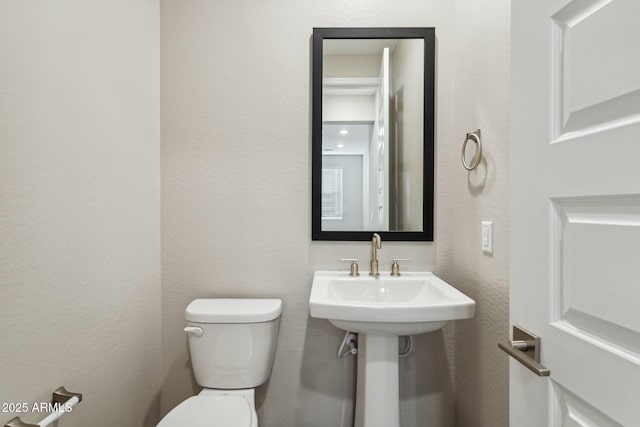 5815 E Covey Ln, Phoenix, AZ 85054 - bathroom with toilet