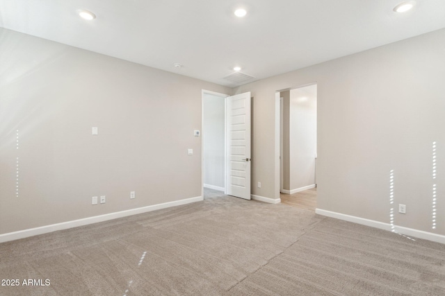 5815 E Covey Ln, Phoenix, AZ 85054 - spare room featuring recessed lighting, baseboards, and light colored carpet