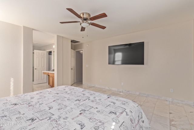 bedroom with connected bathroom and ceiling fan