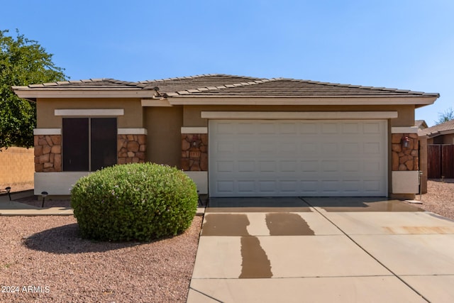 view of front of home with a garage