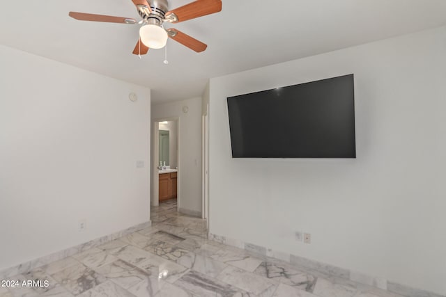 unfurnished living room featuring ceiling fan