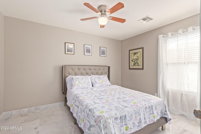 bedroom featuring ceiling fan