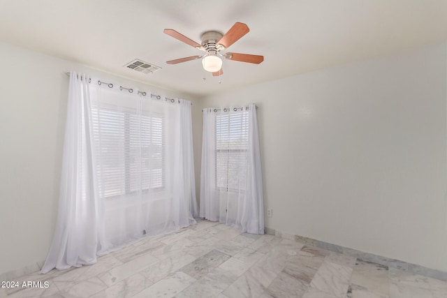 empty room with ceiling fan