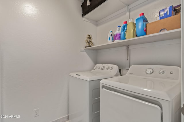 washroom with washer and clothes dryer