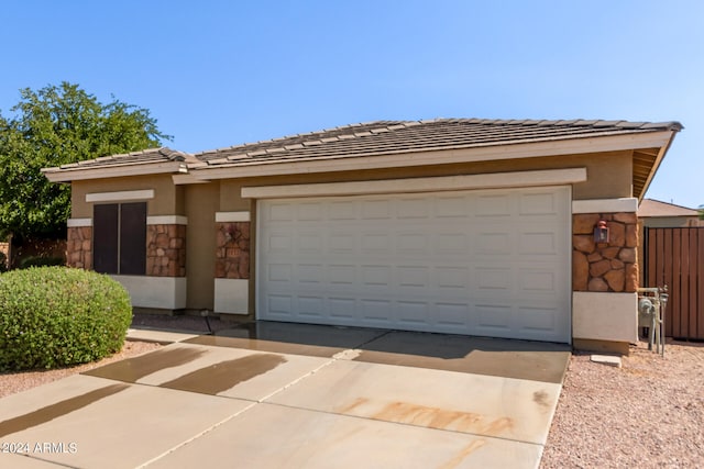 view of front of home with a garage