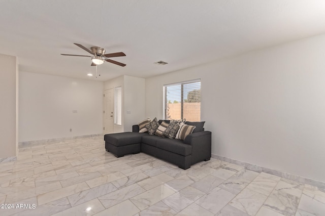 living room featuring ceiling fan