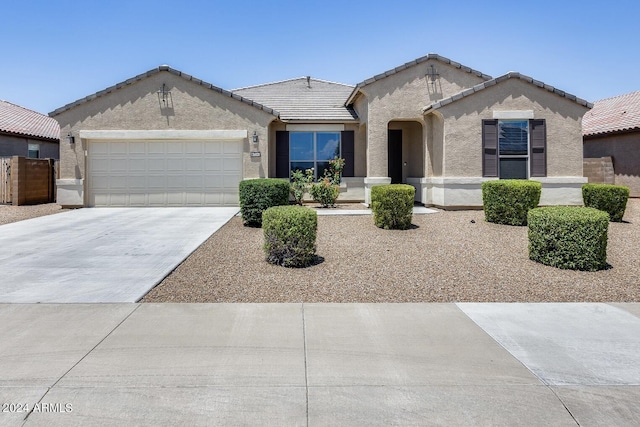 view of front of property featuring a garage