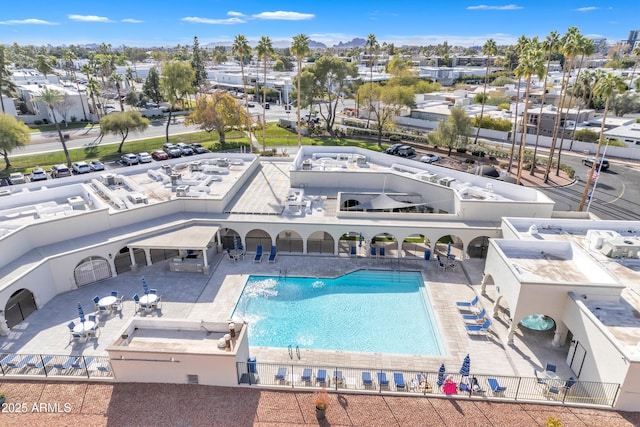 view of swimming pool featuring a patio area