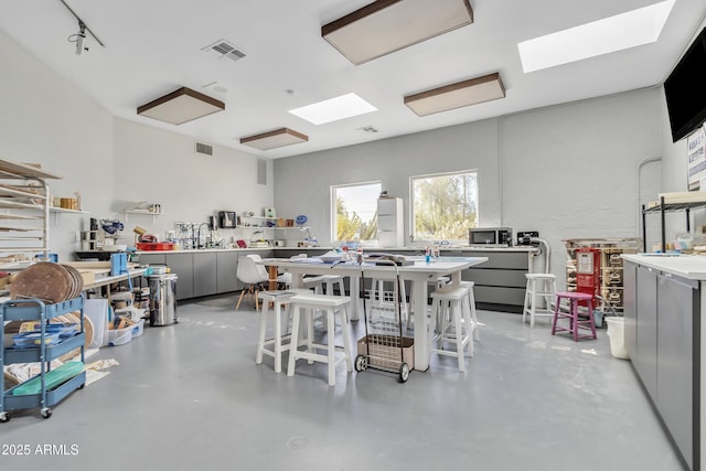 dining room featuring a workshop area