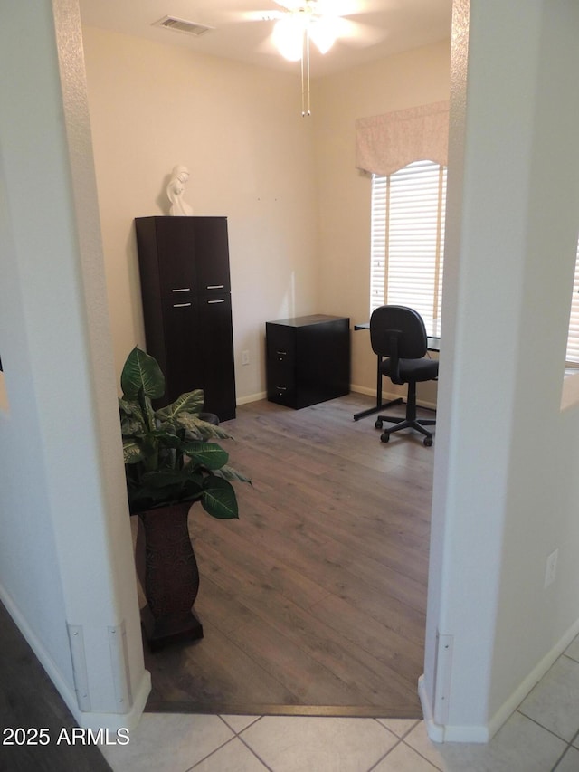 15104 W Pinehurst Ln W, Surprise, AZ 85374 - home office featuring visible vents, baseboards, and wood finished floors