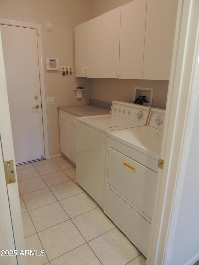 15104 W Pinehurst Ln W, Surprise, AZ 85374 - laundry room featuring light tile patterned floors, cabinet space, and separate washer and dryer