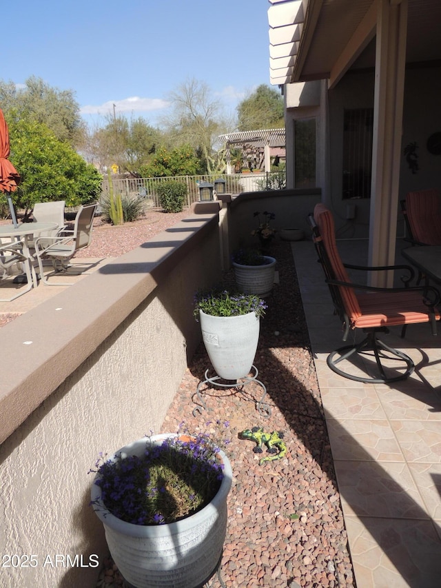 15104 W Pinehurst Ln W, Surprise, AZ 85374 - view of patio featuring fence and a balcony