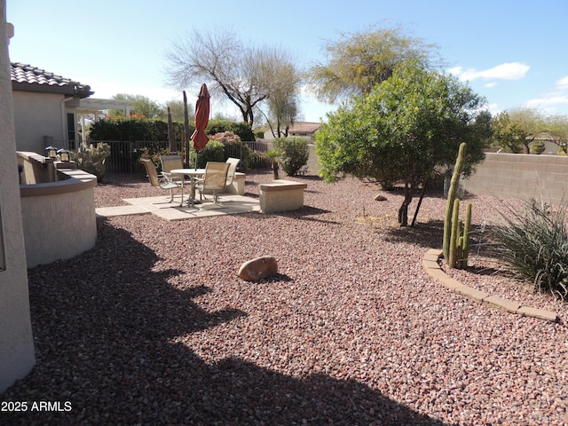 15104 W Pinehurst Ln W, Surprise, AZ 85374 - view of yard with a patio area and fence