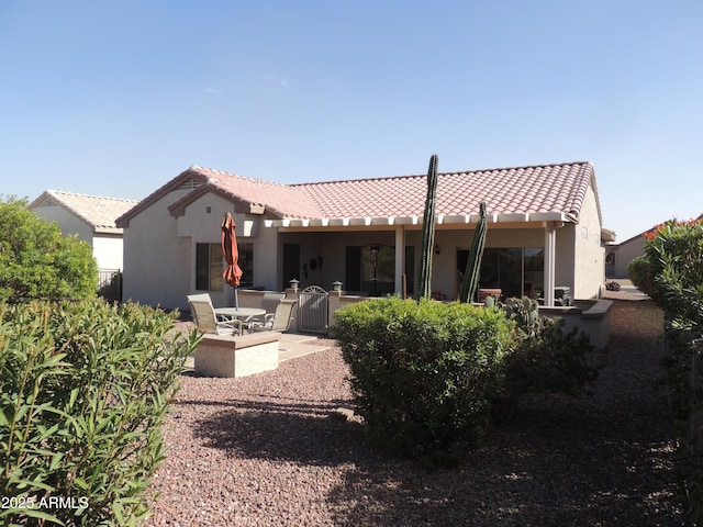 15104 W Pinehurst Ln W, Surprise, AZ 85374 - rear view of property featuring a tile roof, a patio area, and stucco siding
