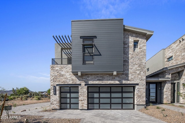 modern home featuring a garage