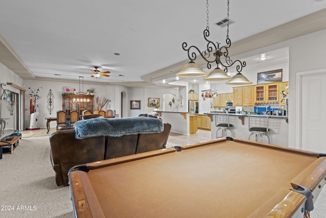 playroom with pool table, ceiling fan, and light colored carpet