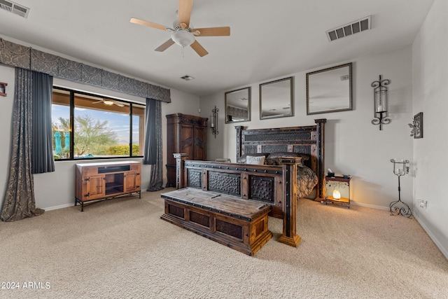 living room featuring ceiling fan, a fireplace, and carpet flooring