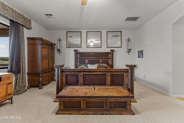 carpeted bedroom with ceiling fan