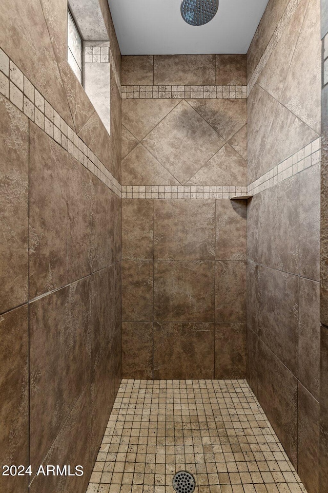 details featuring a tile shower